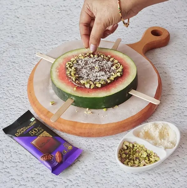 Bournville Chocolate and Watermelon Lollipops-Spread the chopped pistachios and refrigerate