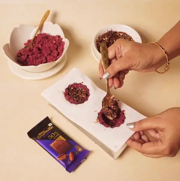 Bournville Chocolate Coated Red Velvet Giant Modak with Coconut and Nuts for Ganesh Chaturthi - Place 1 spoonful of the nut-chocolate mixture