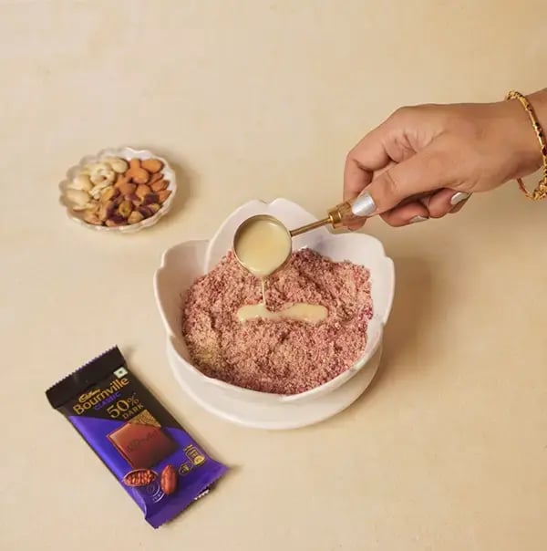 Bournville Chocolate Coated Red Velvet Giant Modak with Coconut and Nuts for Ganesh Chaturthi - Pour in condensed milk