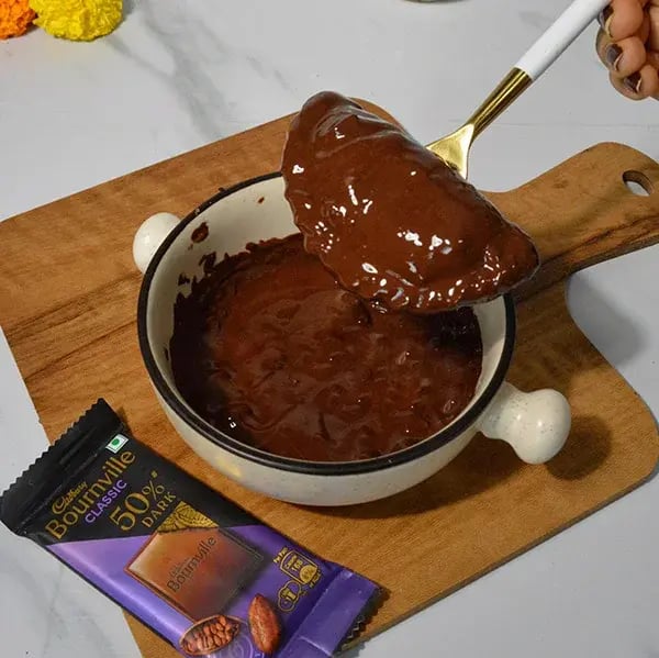 Bournville Chocolate Dipped Tutti Frutti Gujiya - Dip it in melted chocolate