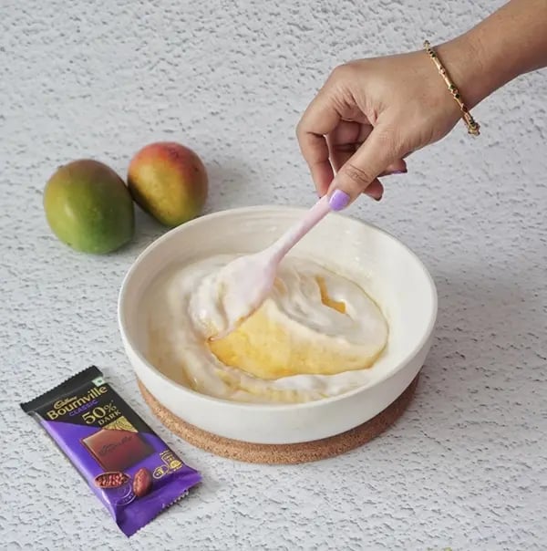 Bournville Chocolate Drizzled Mango Ice Cream-Gently fold with a spatula