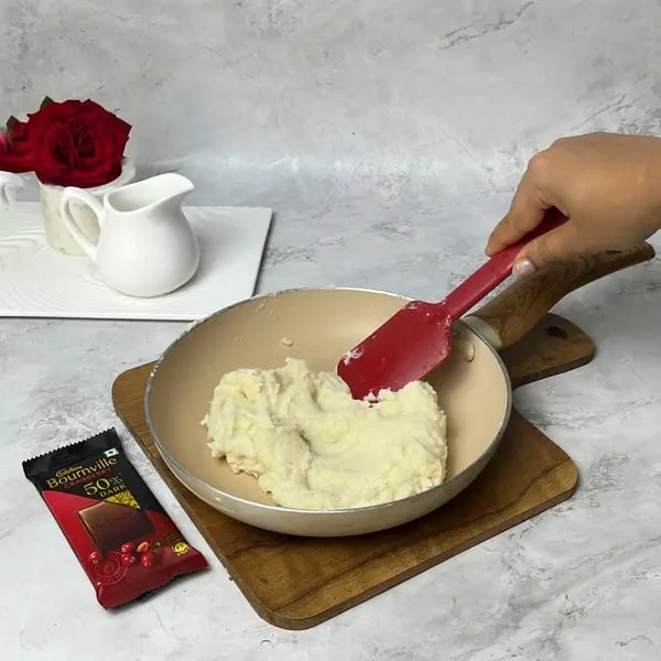 Bournville Chocolate Eclairs - Stirring Dough In Pot