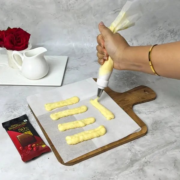 Bournville Chocolate Eclairs - Piping Eclair Dough