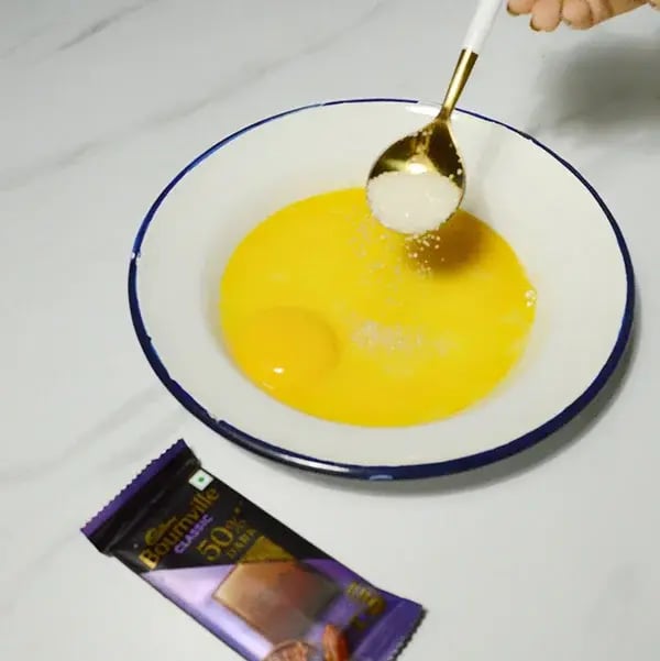 Bournville Chocolate Eggnog - Whisking the egg yolk and sugar
