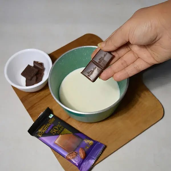 Bournville Chocolate Gulab Sheera - Add Cadbury Bournville chocolates &amp; Milk