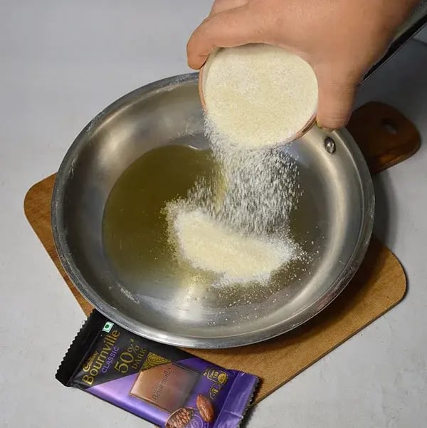 Bournville Chocolate Gulab Sheera - Add ghee and rava