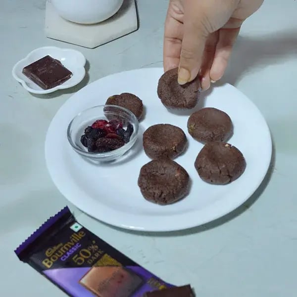 Bournville Chocolate Makhana Peda - Decorate with some berries