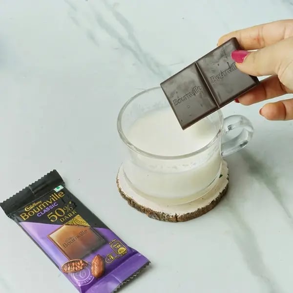 Bournville Chocolate Malpua Rabdi Bites - Cadbury bournville chocolate with one cup warm milk