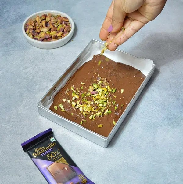 Bournville Chocolate Pistachio Bark - Sprinkle some chopped pistachio