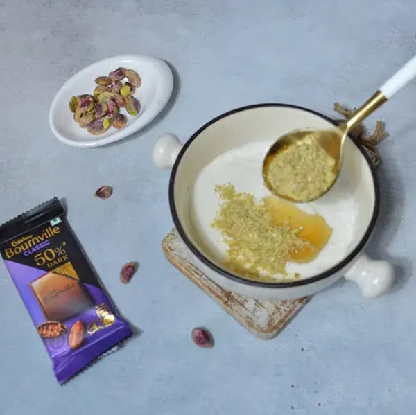 Bournville Chocolate Pistachio Cheesecake - Mix gently