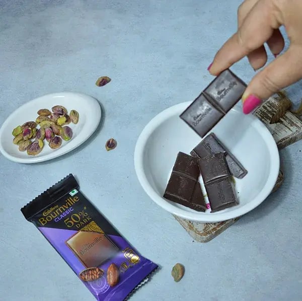 Bournville Chocolate Pistachio Cheesecake - Melt Cadbury Bournville chocolate