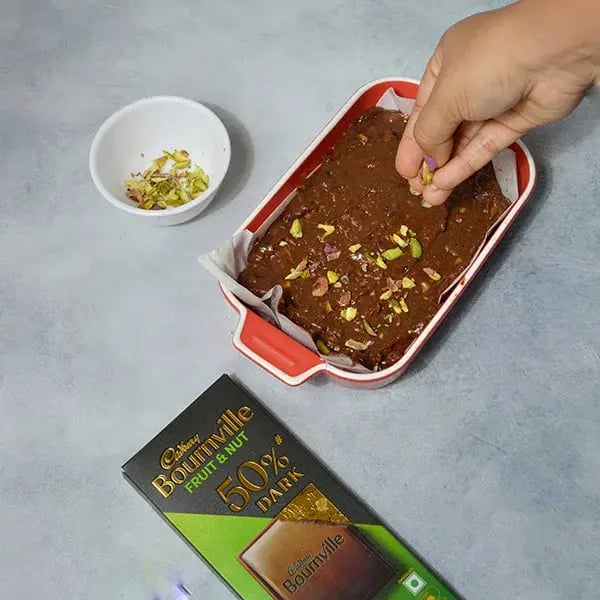 Bournville Chocolate Pistachio Fudge - Pour the mixture in a baking tray