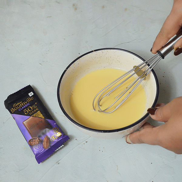 Bournville Chocolate Pudding Recipe - Whisking Custard Mixture