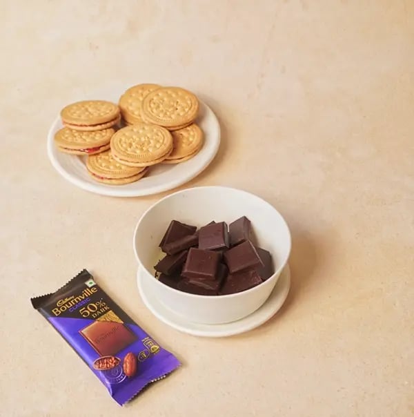 Bournville Chocolate Sandwiches with Biscuit and Jam-Break the Cadbury Bournville chocolate into small pieces