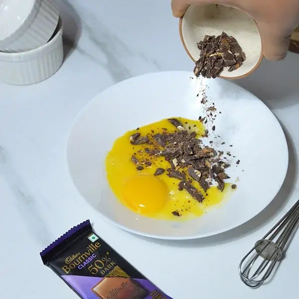 Bournville Chocolate Souffle - Add egg yolks &amp; chopped chocolate