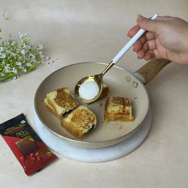 Bournville Chocolate Toast Dessert - Sprinkling Sugar On Bread