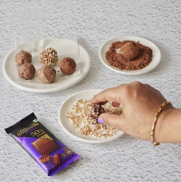 Bournville Chocolate Truffle with Almonds-Roll the truffles in cocoa powder