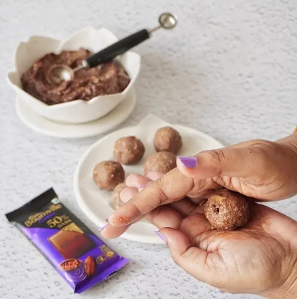 Bournville Chocolate Truffle with Almonds-Quickly roll each portion