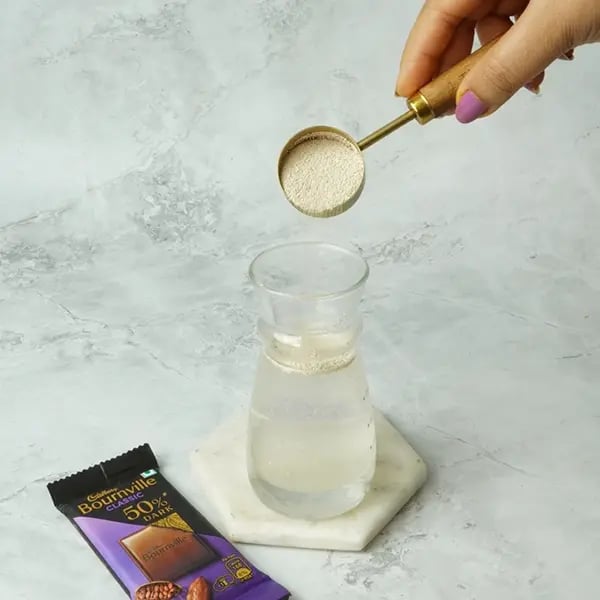 Bournville Cinnamon Lokma-In a measuring cup