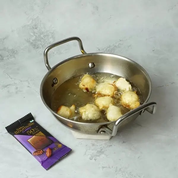 Bournville Cinnamon Lokma-Preheat the vegetable oil