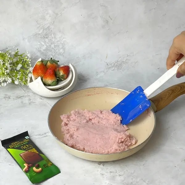 Bournville Coated Strawberry Coconut Fudge - Stirring Fudge Mixture