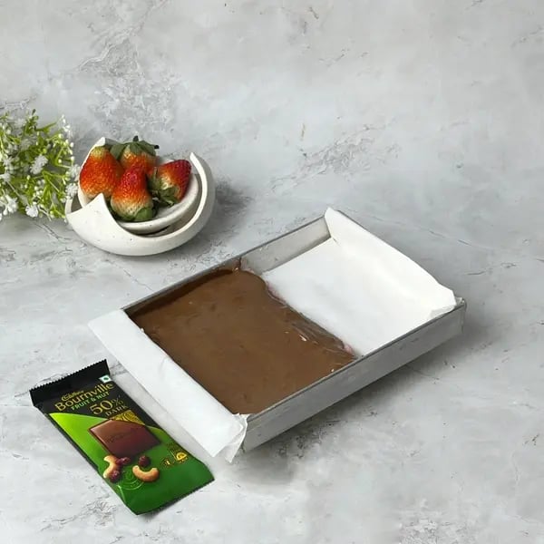 Bournville Coated Strawberry Coconut Fudge - Pouring Melted Chocolate