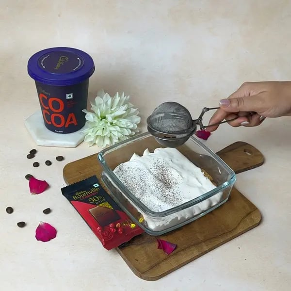 Bournville Cocoa Tiramisu Icebox Cake - Dusting Coffee Powder