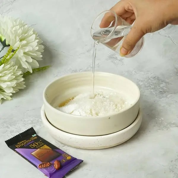 Bournville Coconut Sel Roti-Now add water and give it a mix