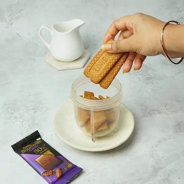 Bournville Covered No-Bake Biscoff Cheesecake-Start by placing Biscoff biscuits