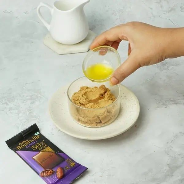 Bournville Covered No-Bake Biscoff Cheesecake-Pour the finely ground Biscoff powder