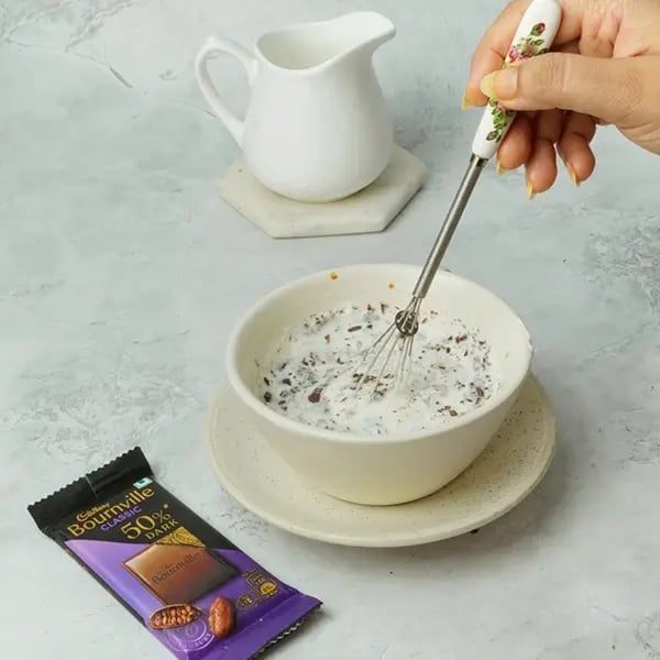 Bournville Covered No-Bake Biscoff Cheesecake-Use a spatula or whisk