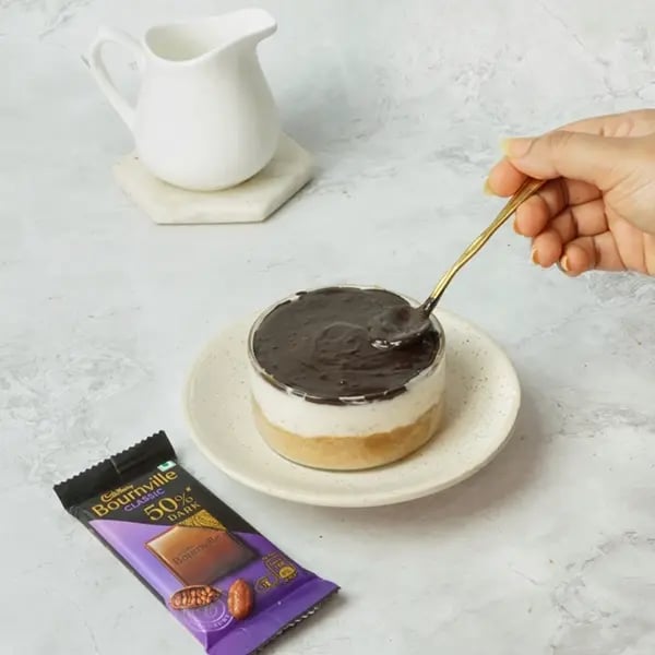 Bournville Covered No-Bake Biscoff Cheesecake-Once the chocolate is melted and silky