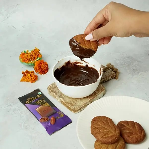 Bournville Dipped Thekua for Chhath Pooja-Dip thekua into melted chocolate
