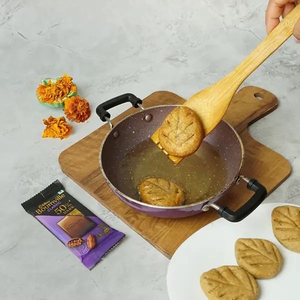 Bournville Dipped Thekua for Chhath Pooja-Heat oil in a kadai