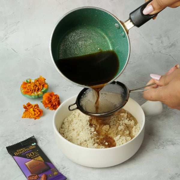 Bournville Dipped Thekua for Chhath Pooja-Strain the jaggery water