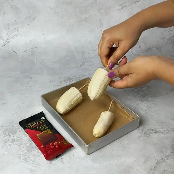 Bournville Dipped Frozen Banana Yogurt Popsicles - Frozen Banana Halves
