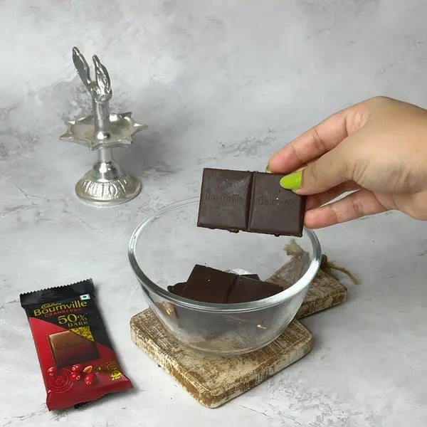 Bournville Dipped Oreo Modak - Melting Chocolate