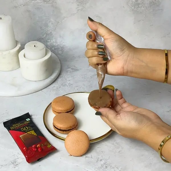 Bournville Filled Chocolate Macarons - Piping Ganache Onto Shells