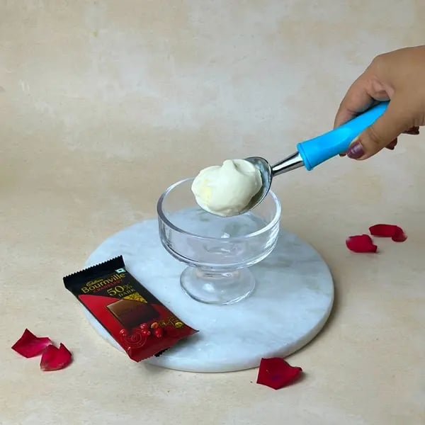 Bournville-Filled Death By Chocolate Dessert - Scooping Vanilla Ice Cream