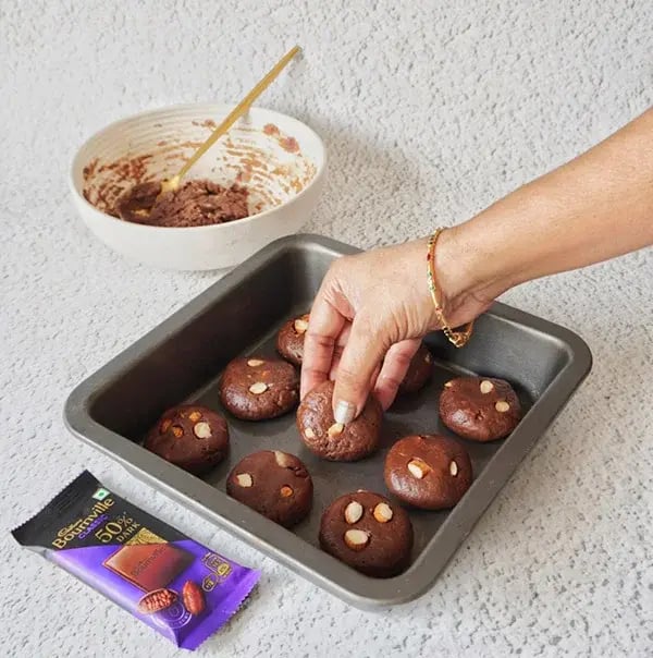 Bournville Flavored Dry Fruit Cookies - Roll the dough into small balls