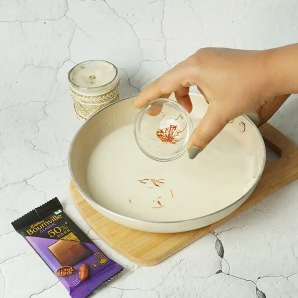 Bournville Kesar Kaju Katli - Add Kesar to the same pan
