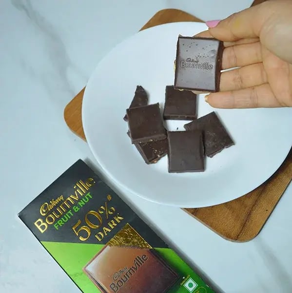 Bournville Makhana Chikki Recipe - Melted Bournville Chocolate