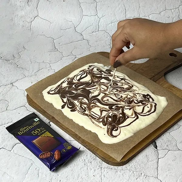 Bournville Marshmallow Yogurt Bark-Gently pour melted chocolate