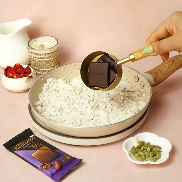 Bournville Narkel Naru for Durga Puja-Once the sugar has melted and been mixed with the coconut