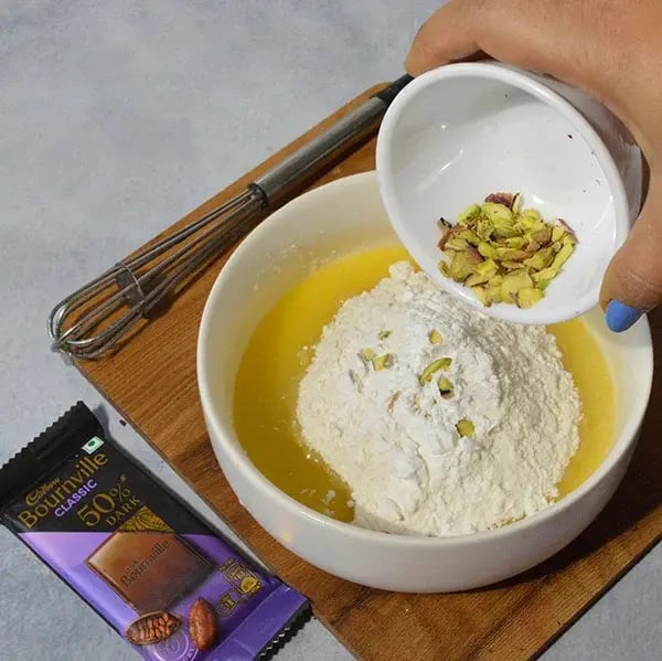 Bournville Pistachio Rose Sugar Cookies - Add the finely chopped pistachios