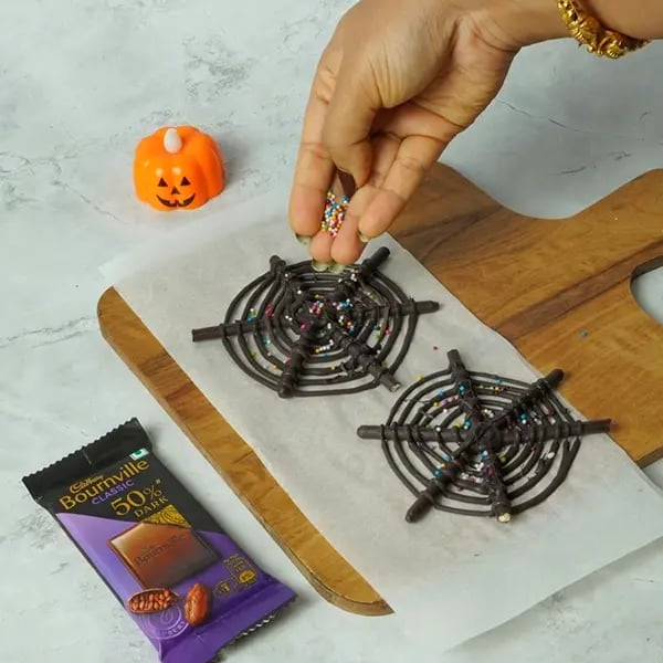 Bournville Pocky Web Spider Bites for Halloween-Sprinkle some colourful sprinkles