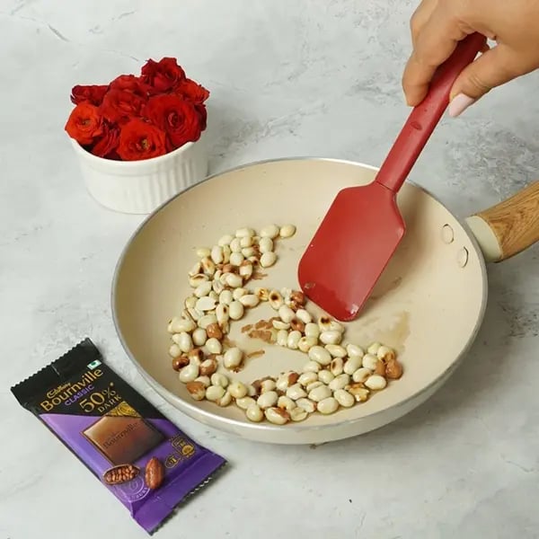 Bournville Poha Peanut Laddu for Chhath Pooja-Add ghee to a heavy bottom pan