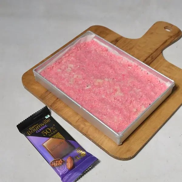 Bournville Rose Coconut Barfi - Spoon the mixture