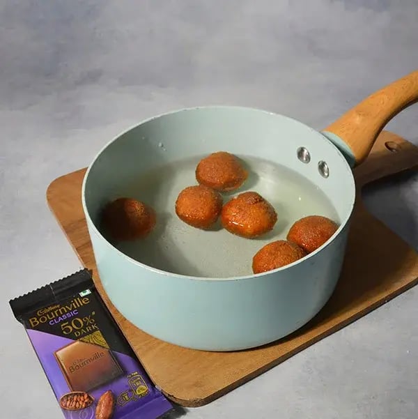 Bournville Rose Gulab Jamun - Put them in the sugar syrup