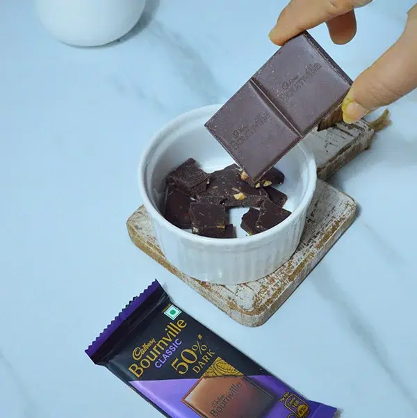 Indulgent Bournville Shrikhand Chia Pudding Recipe - Melted Bournville Chocolate